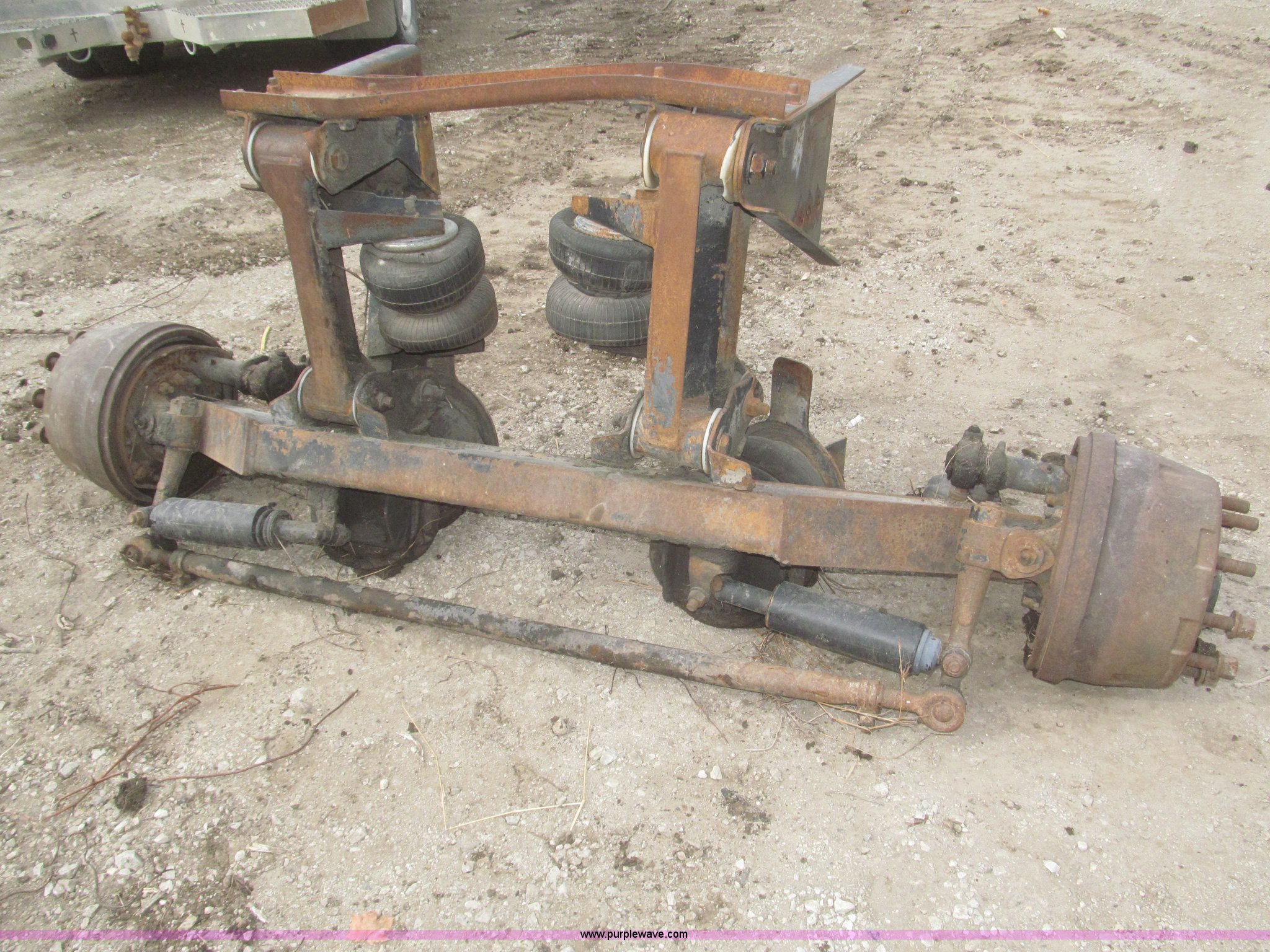 (2) steerable pusher axles in Elliott, IA Item F7303 sold Purple Wave