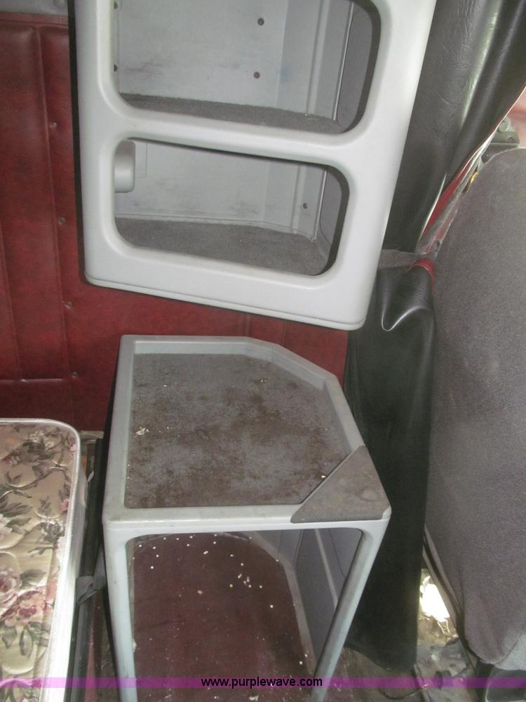 image for item F7343 2000 Freightliner FLD120 semi truck