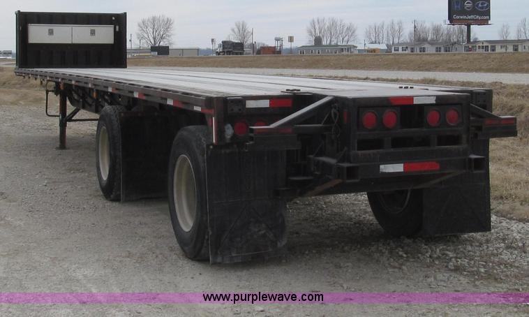 image for item G2335 1989 Transcraft TL90K-45 split-axle flatbed trailer