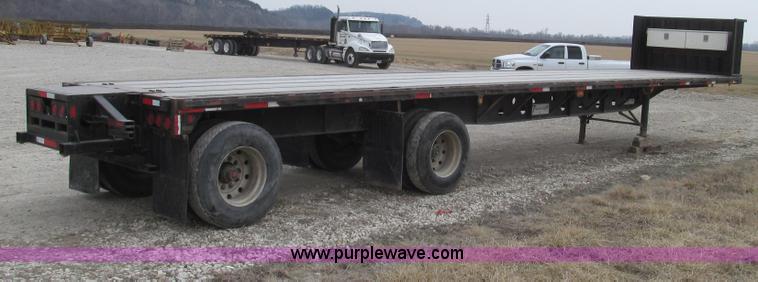 image for item G2335 1989 Transcraft TL90K-45 split-axle flatbed trailer