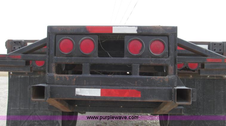 image for item G2335 1989 Transcraft TL90K-45 split-axle flatbed trailer
