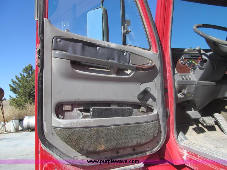 image for item I7208 1998 Freightliner FLC120 semi truck