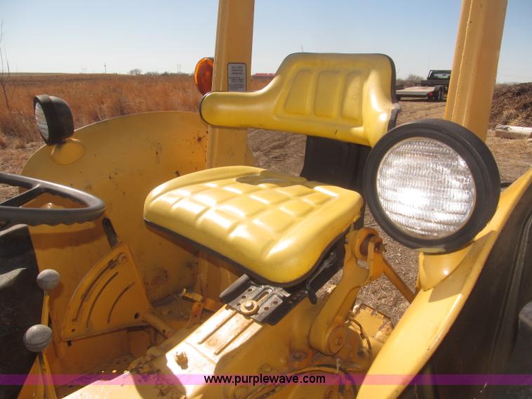 image for item F7304 John Deere 301W industrial tractor