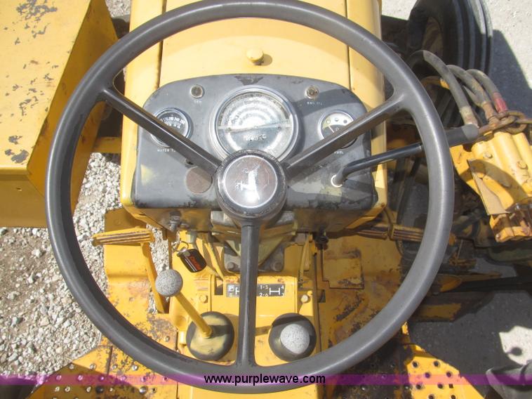 image for item F7304 John Deere 301W industrial tractor