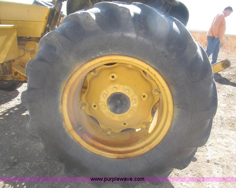 image for item F7304 John Deere 301W industrial tractor