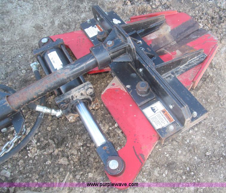 Rotating tree shear/limb trimmer skid steer attachment in Persia, IA
