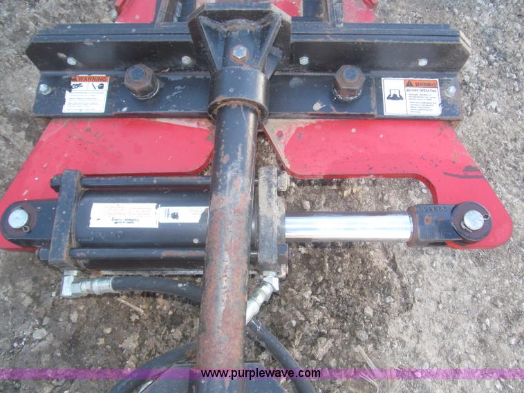 Rotating tree shear/limb trimmer skid steer attachment in Persia, IA