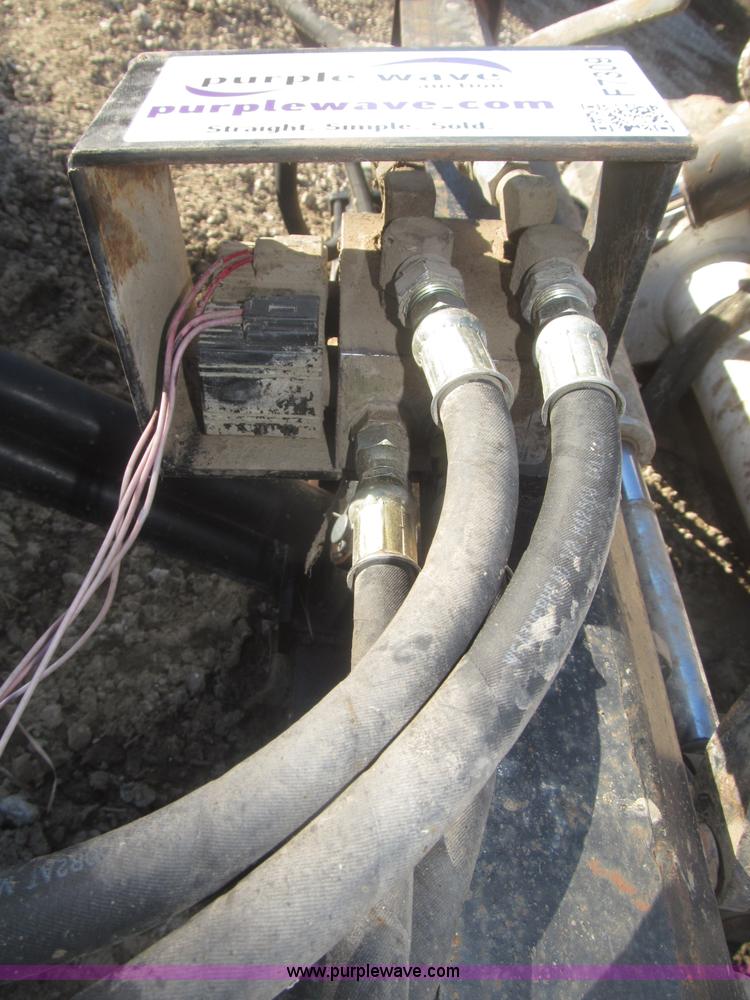 image for item F7309 Rotating tree shear/limb trimmer skid steer attachment