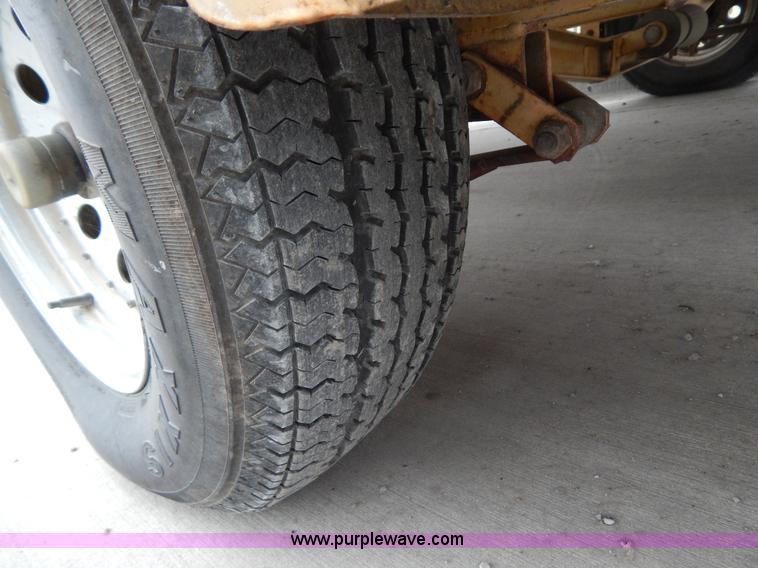 image for item I1053 1986 Charger 200 T-PRO fishing boat and trailer