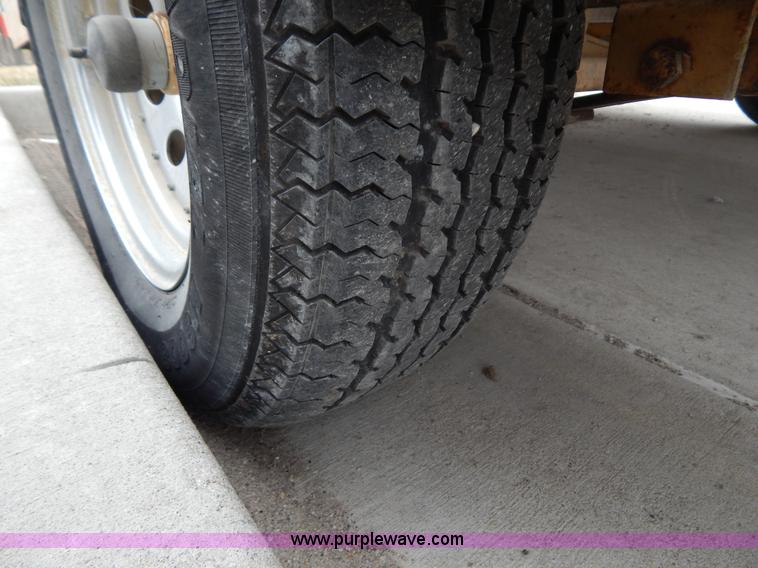 image for item I1053 1986 Charger 200 T-PRO fishing boat and trailer