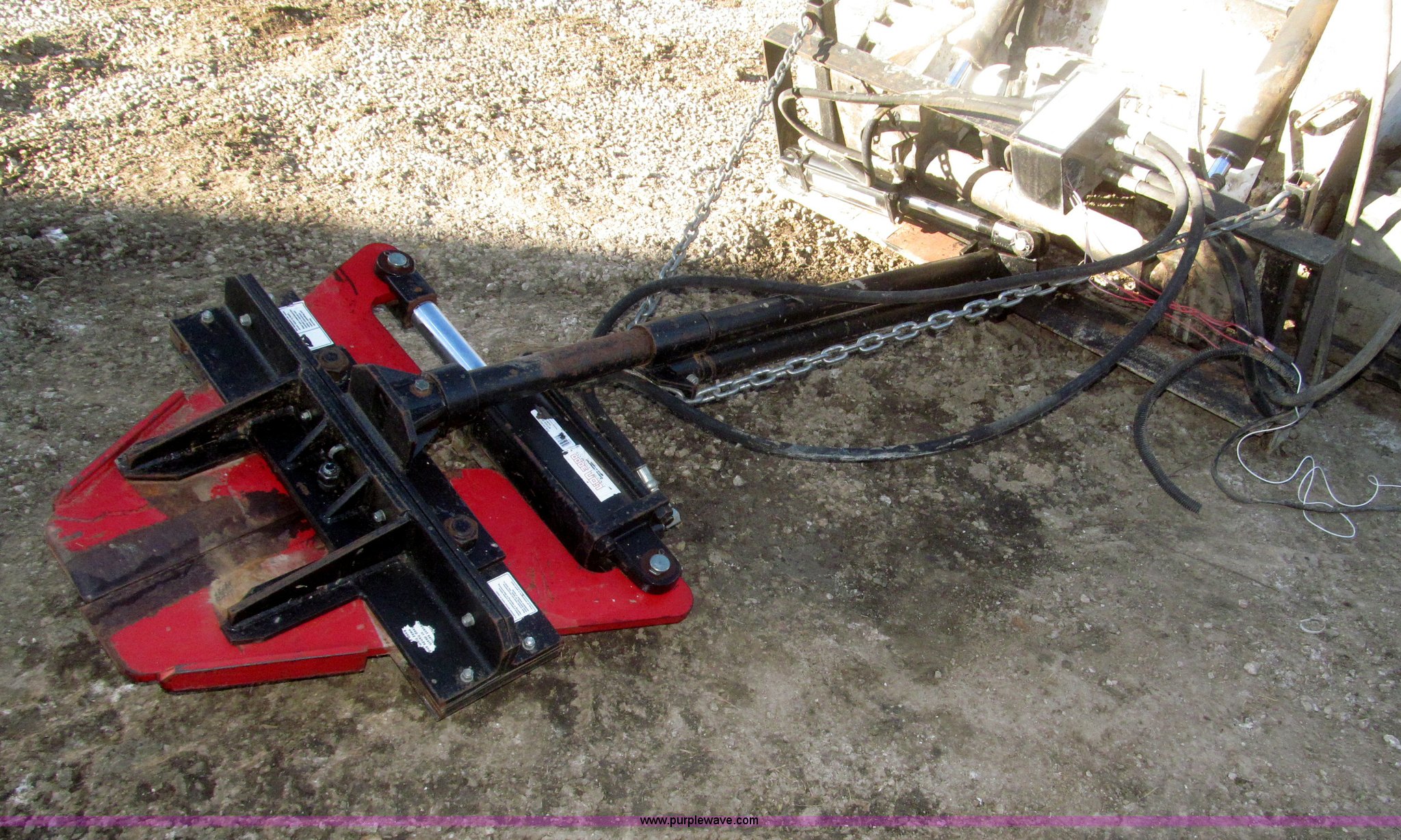 Rotating tree shear/limb trimmer skid steer attachment in Persia, IA