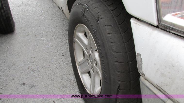 image for item G9144 2008 Dodge Ram 1500 Quad Cab pickup truck