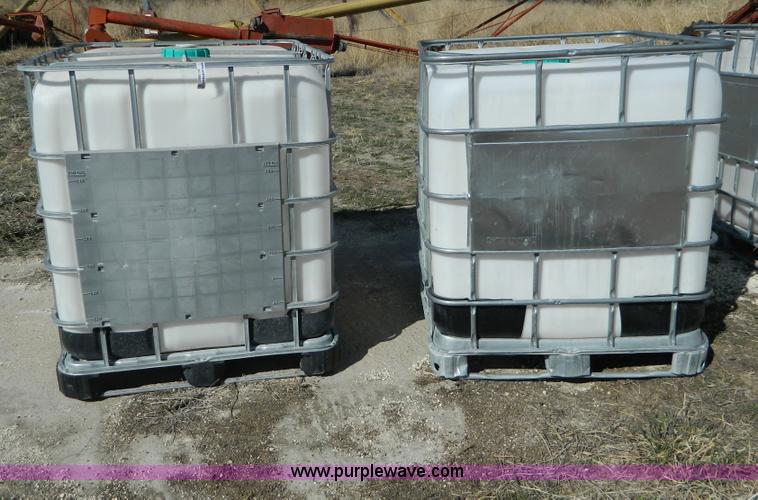 image for item AD9860 (2) 250 gallon liquid transfer tanks