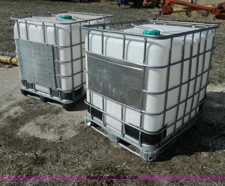 image for item AD9860 (2) 250 gallon liquid transfer tanks