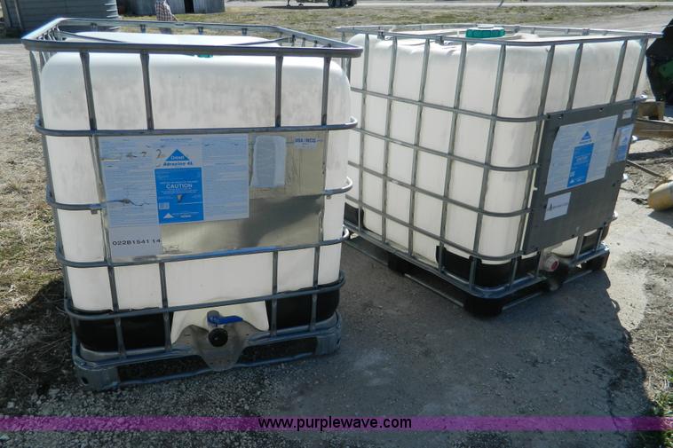 image for item AD9860 (2) 250 gallon liquid transfer tanks