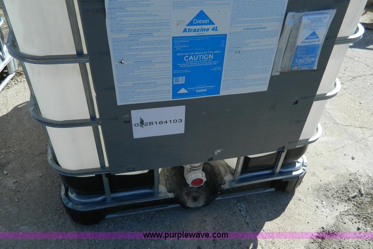 image for item AD9860 (2) 250 gallon liquid transfer tanks