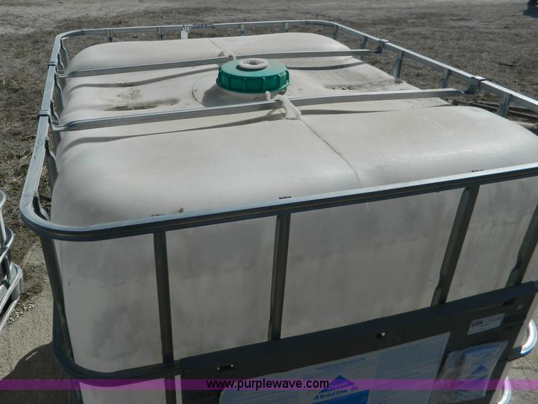 image for item AD9860 (2) 250 gallon liquid transfer tanks