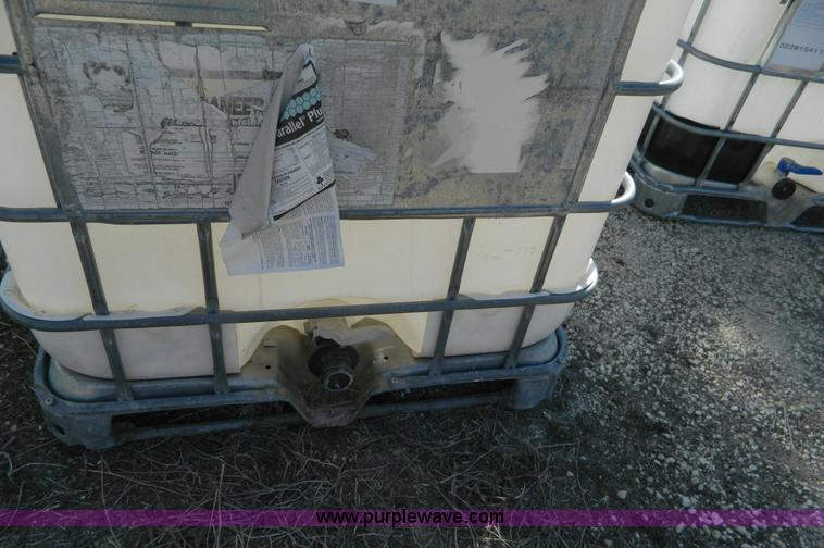 image for item AD9861 (2) 250 gallon liquid transfer tanks