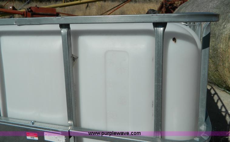 image for item AD9861 (2) 250 gallon liquid transfer tanks