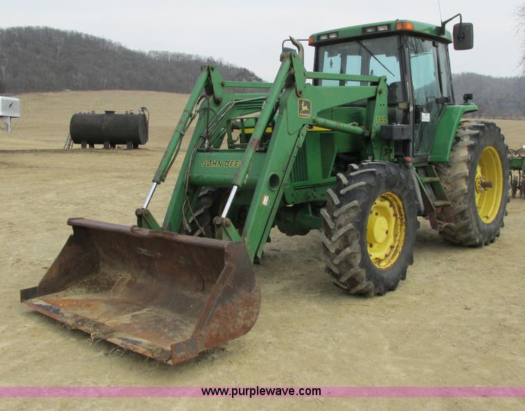 image for item G8791 1997 John Deere 7410 MFWD tractor