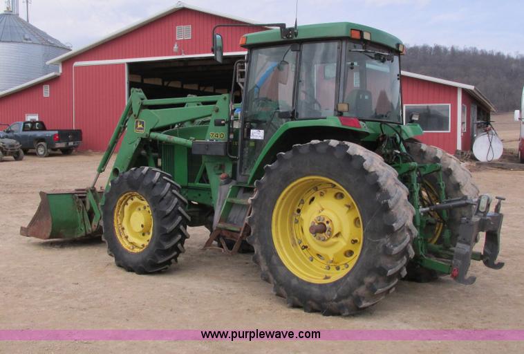 image for item G8791 1997 John Deere 7410 MFWD tractor