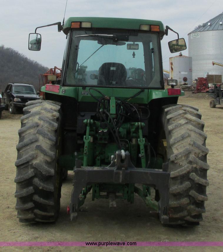 image for item G8791 1997 John Deere 7410 MFWD tractor