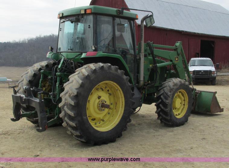 image for item G8791 1997 John Deere 7410 MFWD tractor
