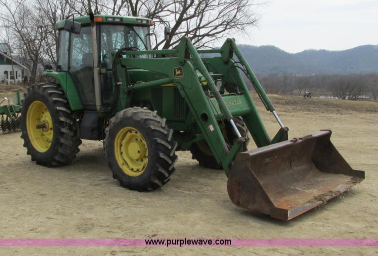 image for item G8791 1997 John Deere 7410 MFWD tractor