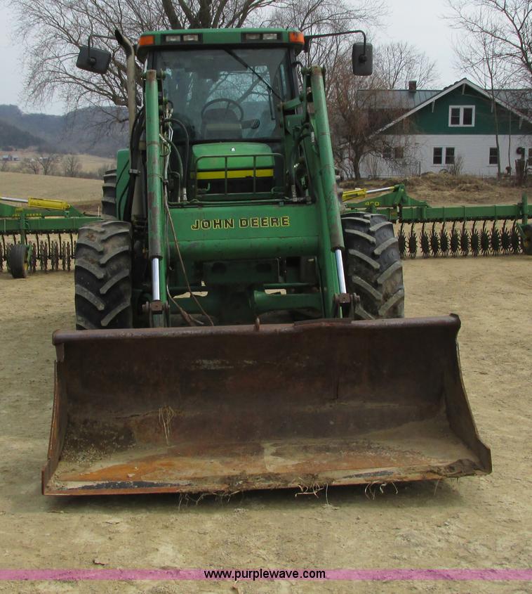 image for item G8791 1997 John Deere 7410 MFWD tractor