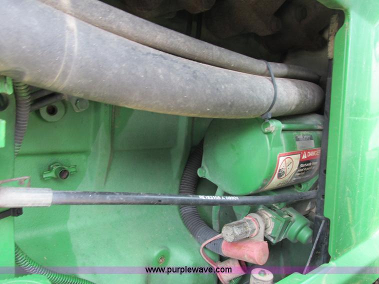 image for item G8791 1997 John Deere 7410 MFWD tractor