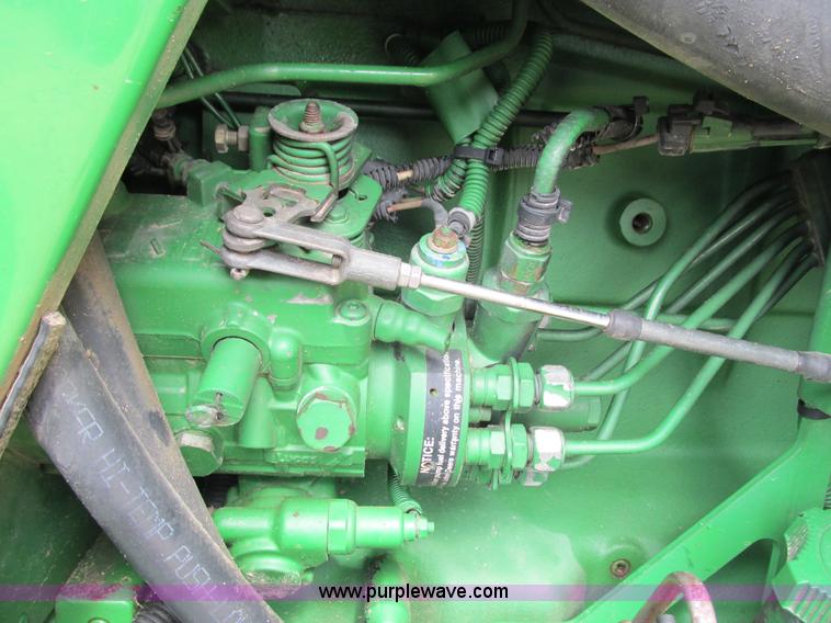 image for item G8791 1997 John Deere 7410 MFWD tractor