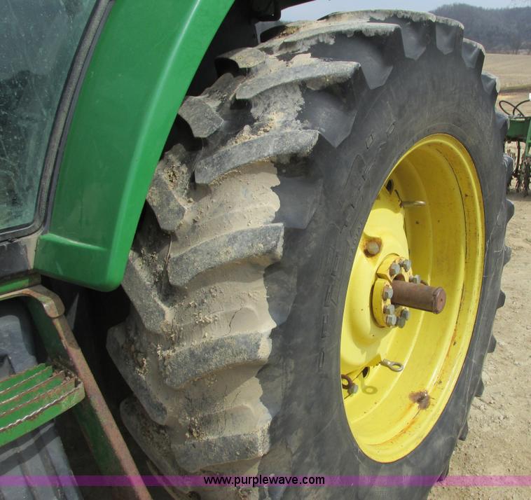 image for item G8791 1997 John Deere 7410 MFWD tractor