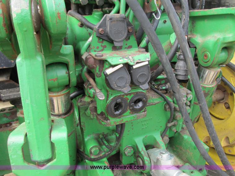 image for item G8791 1997 John Deere 7410 MFWD tractor