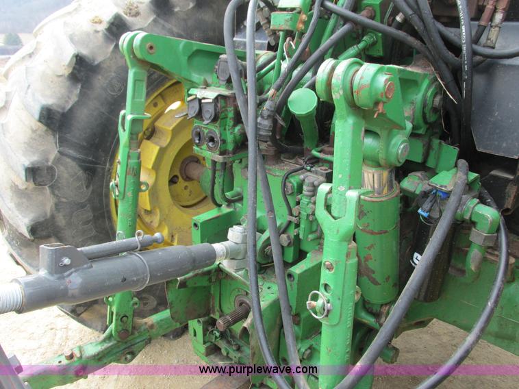 image for item G8791 1997 John Deere 7410 MFWD tractor