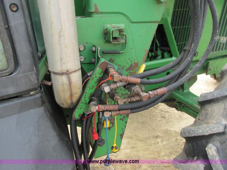 image for item G8791 1997 John Deere 7410 MFWD tractor