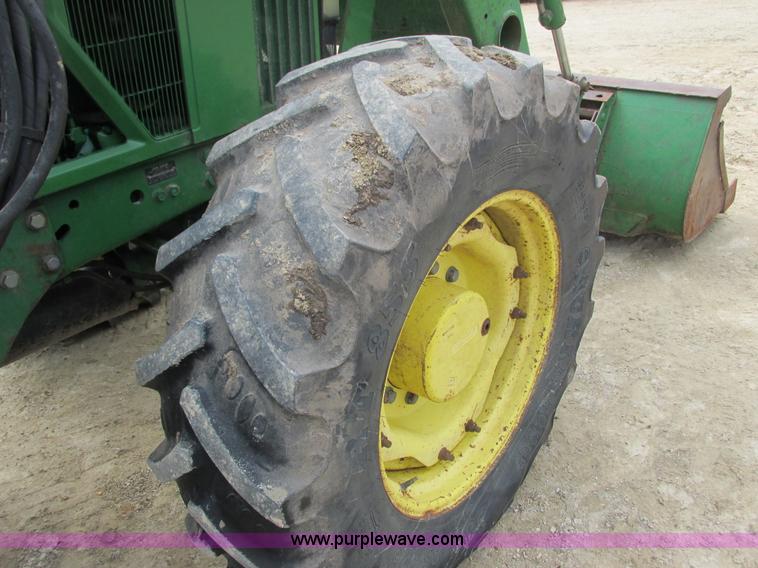 image for item G8791 1997 John Deere 7410 MFWD tractor
