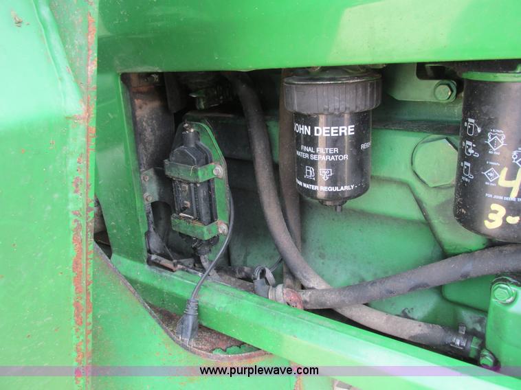 image for item G8791 1997 John Deere 7410 MFWD tractor