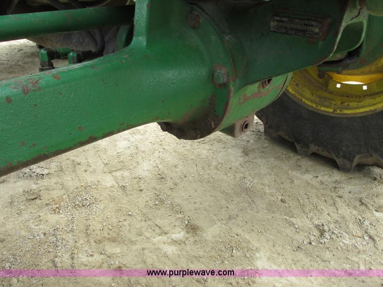 image for item G8791 1997 John Deere 7410 MFWD tractor