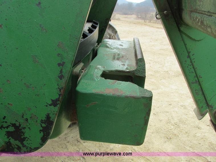 image for item G8791 1997 John Deere 7410 MFWD tractor