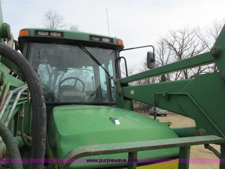 image for item G8791 1997 John Deere 7410 MFWD tractor