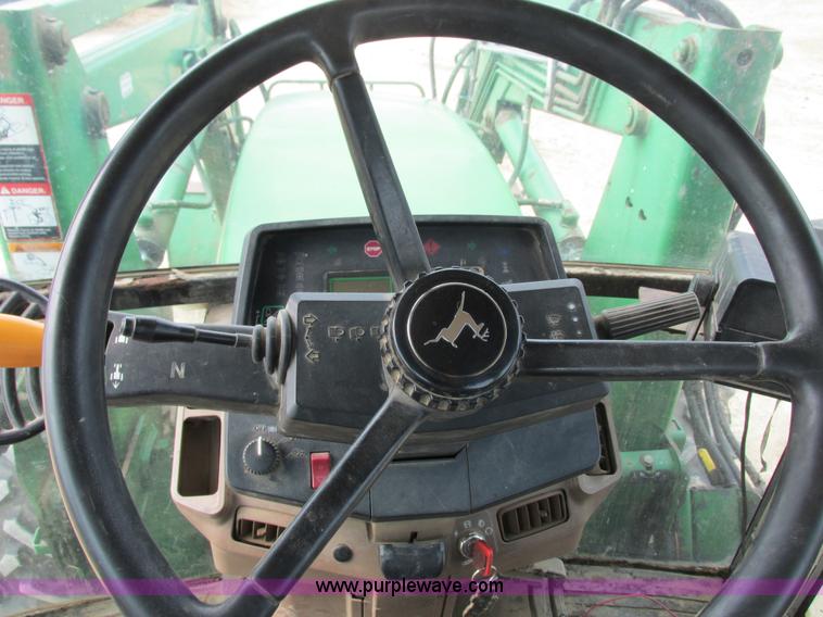 image for item G8791 1997 John Deere 7410 MFWD tractor