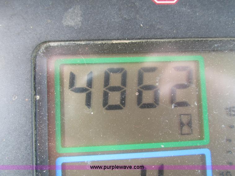 image for item G8791 1997 John Deere 7410 MFWD tractor