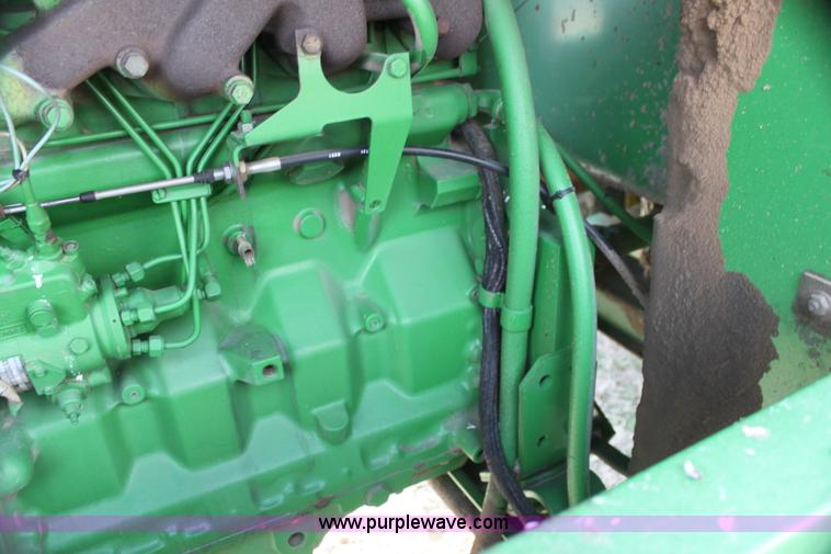 image for item H2197 1995 John Deere 3830 swather