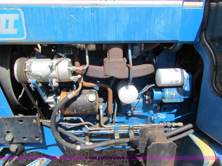 image for item H2216 1991 Ford 7710 tractor