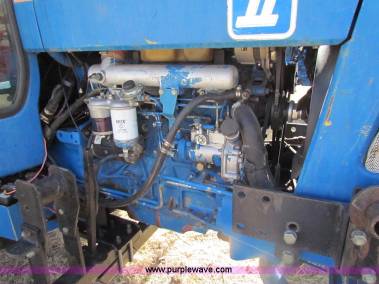 image for item H2216 1991 Ford 7710 tractor