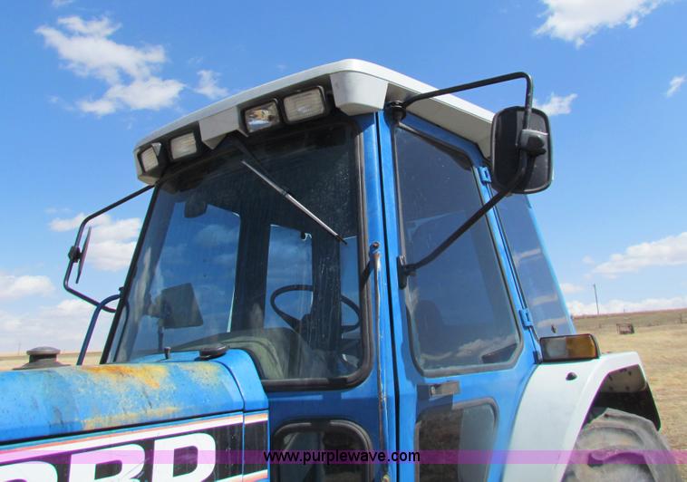 image for item H2216 1991 Ford 7710 tractor