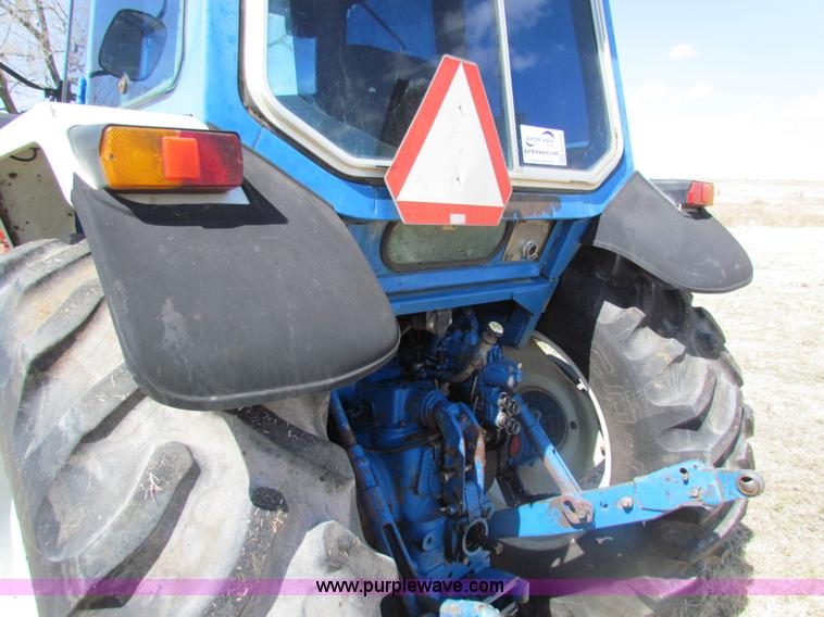 image for item H2216 1991 Ford 7710 tractor