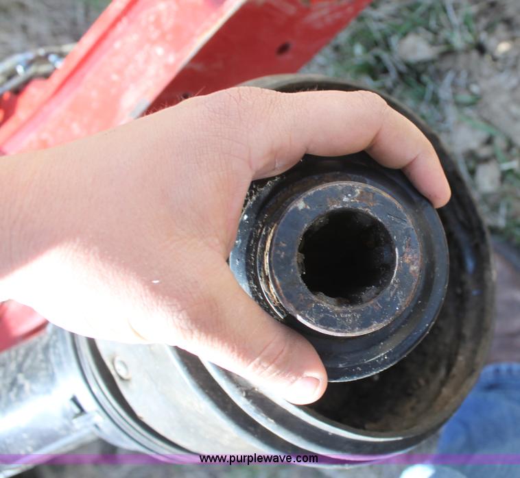 image for item H2218 2009 New Holland BR7090 round baler