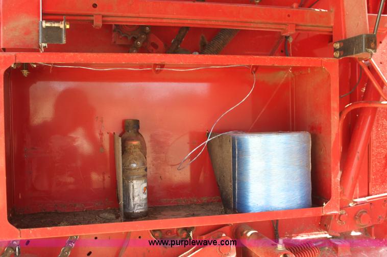 image for item H2218 2009 New Holland BR7090 round baler