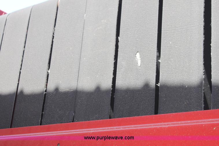 image for item H2218 2009 New Holland BR7090 round baler